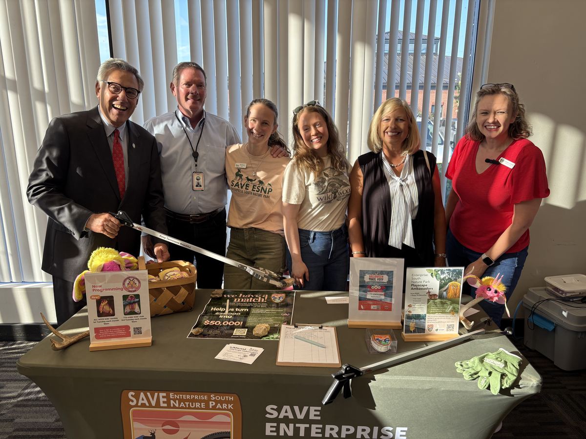 State Rep. Greg Vital, County Commissioner Jeff Eversole, and volunteers at the Save Enterprise South Nature Park table at the August 31 volunteer fair