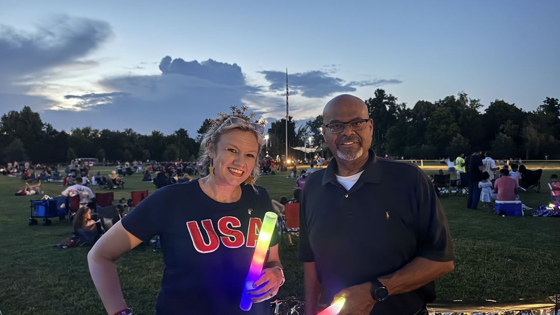 Passing out light-up toys with City Judge Curtis Bowe at the 2026 Fourth of July Freedom Celebration